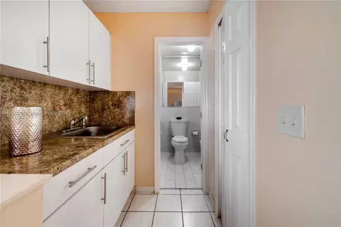 Kitchen - 6938 W 30th Ave, Hialeah, FL 33018 photo 8 of 8
