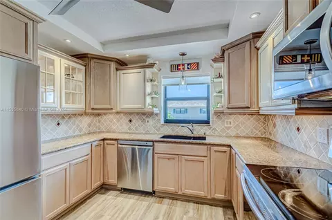 Kitchen - 755 S Saturn St #E201, Jupiter, FL 33477 photo 3 of 7
