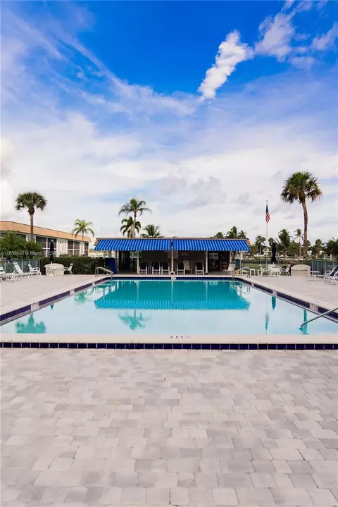 Exterior - 755 S Saturn St #E201, Jupiter, FL 33477 photo 9 of 11