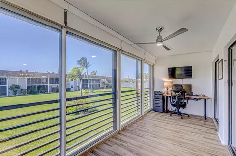 Living - 755 S Saturn St #E201, Jupiter, FL 33477 photo 2 of 9