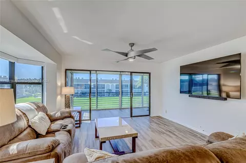 Living - 755 S Saturn St #E201, Jupiter, FL 33477 photo 6 of 9