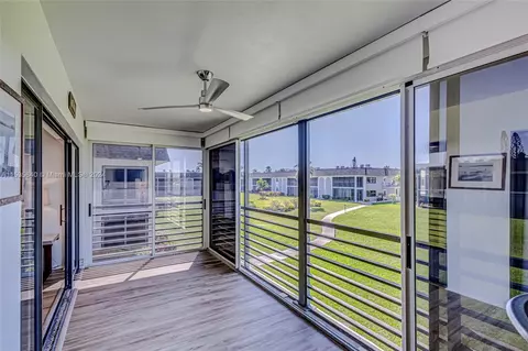 Exterior - 755 S Saturn St #E201, Jupiter, FL 33477 photo 2 of 11