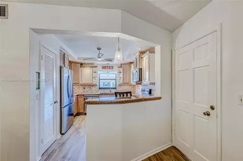 Kitchen - 755 S Saturn St #E201, Jupiter, FL 33477 photo 1 of 7