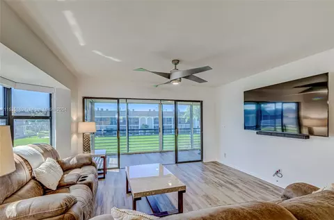 Living - 755 S Saturn St #E201, Jupiter, FL 33477 photo 5 of 9
