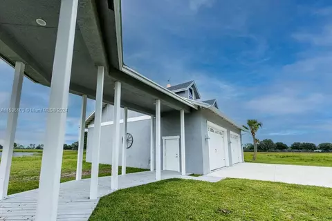 Exterior - 25601 SW Hannahs Path, Okeechobee, FL 34974 photo 9 of 16