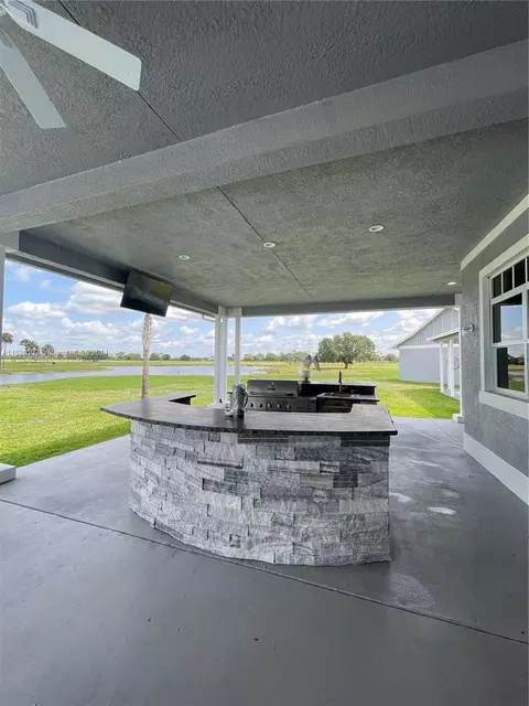 Exterior - 25601 SW Hannahs Path, Okeechobee, FL 34974 photo 14 of 16