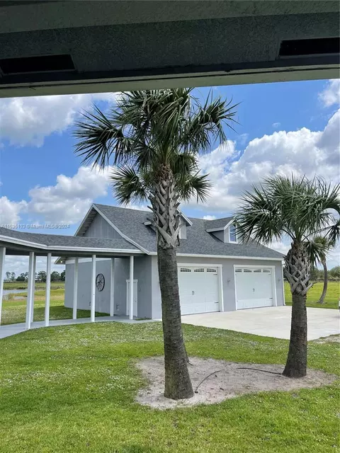 Exterior - 25601 SW Hannahs Path, Okeechobee, FL 34974 photo 15 of 16