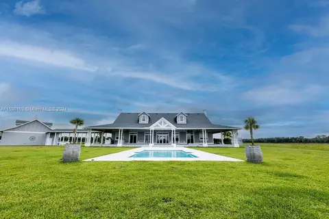 Exterior - 25601 SW Hannahs Path, Okeechobee, FL 34974 photo 8 of 16