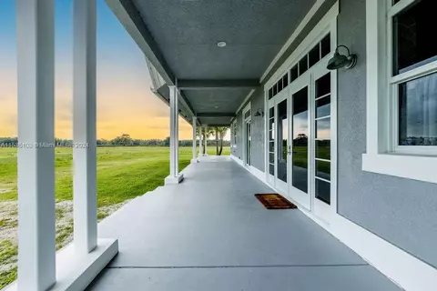 Exterior - 25601 SW Hannahs Path, Okeechobee, FL 34974 photo 3 of 16