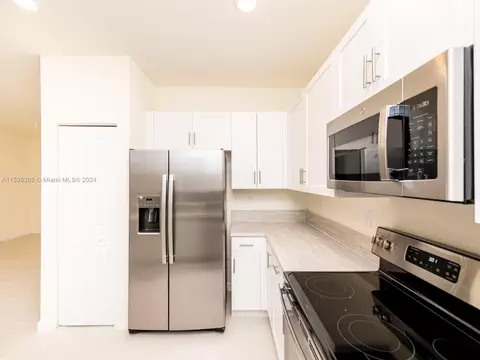 Kitchen - 3358 W 112th St #3358, Hialeah, FL 33018 photo 5 of 5