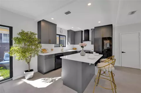 Kitchen - 8950 NE 3rd Ave, El Portal, FL 33138 photo 1 of 5