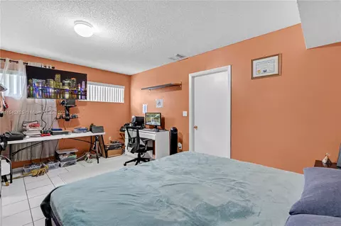 Bedroom - 247 E 52nd St, Hialeah, FL 33013 photo 4 of 6
