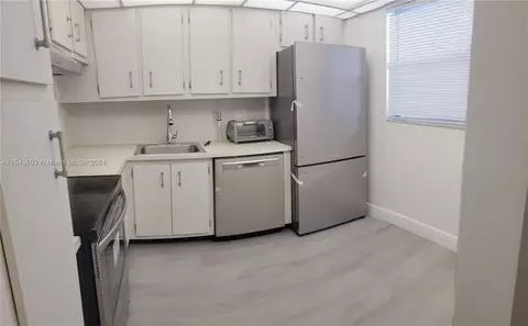 3060 Holiday Springs Blvd #306, Margate, FL 33063