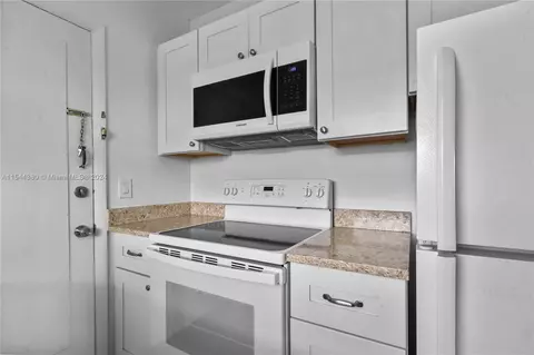 Kitchen - 1480 E Sample Rd #311, Pompano Beach, FL 33064 photo 2 of 4