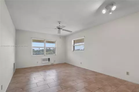 Living - 1480 E Sample Rd #311, Pompano Beach, FL 33064 photo 1 of 2