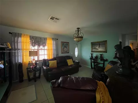 Living - 740 E 6th Pl, Hialeah, FL 33010 photo 2 of 3