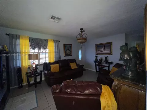 Living - 740 E 6th Pl, Hialeah, FL 33010 photo 3 of 3