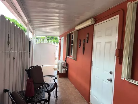 Exterior - 740 E 6th Pl, Hialeah, FL 33010 photo 9 of 11