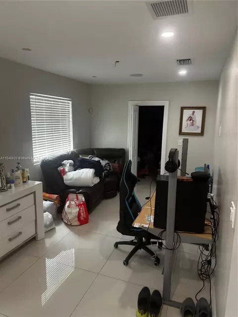 Living - 630 W 50th Pl, Hialeah, FL 33012 photo 3 of 3