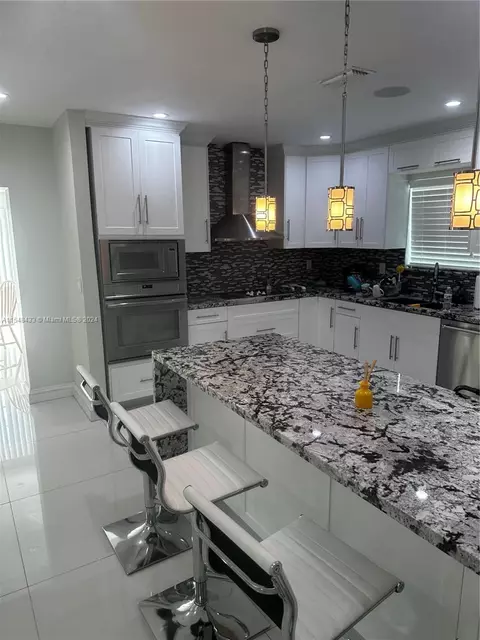 Kitchen - 630 W 50th Pl, Hialeah, FL 33012 photo 1 of 4