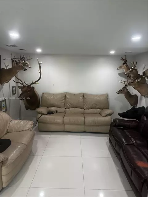 Living - 630 W 50th Pl, Hialeah, FL 33012 photo 1 of 3