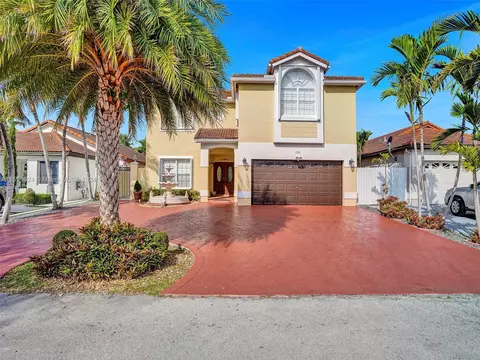 Exterior - 19824 NW 86th Ct, Hialeah, FL 33015 photo 1 of 12