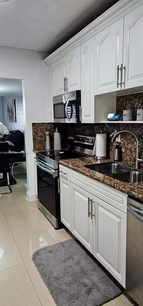 Kitchen - 1676 W 72nd St, Hialeah, FL 33014 photo 8 of 8