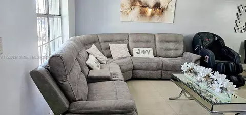 Living - 1676 W 72nd St, Hialeah, FL 33014 photo 2 of 16