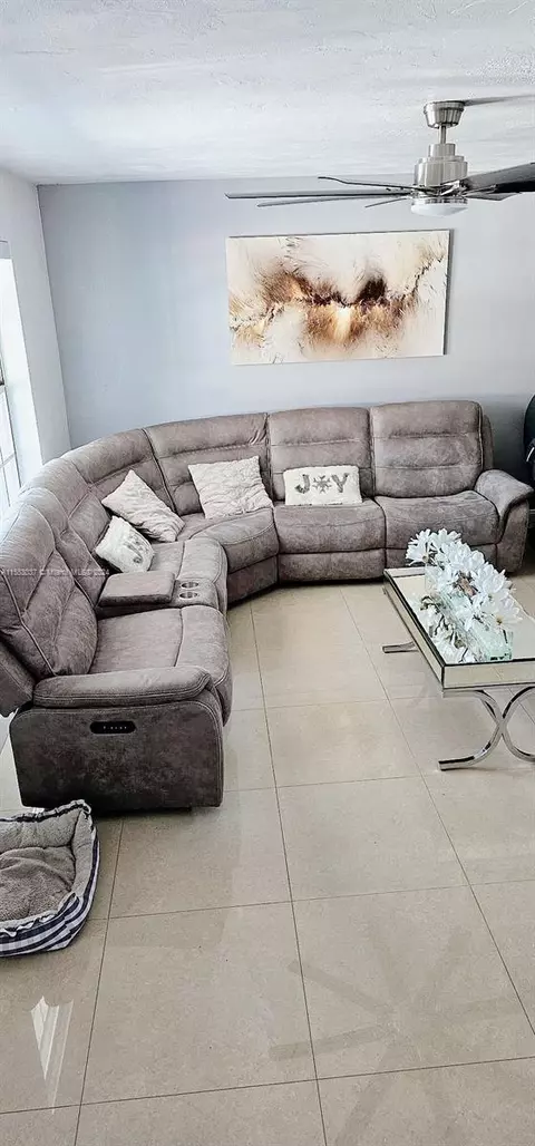 Living - 1676 W 72nd St, Hialeah, FL 33014 photo 1 of 16
