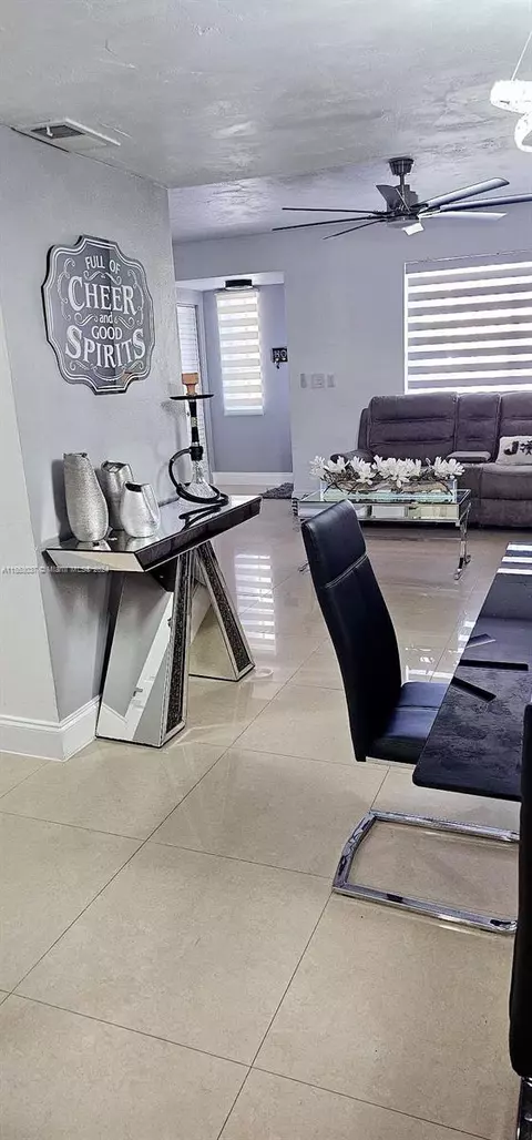 Living - 1676 W 72nd St, Hialeah, FL 33014 photo 8 of 16