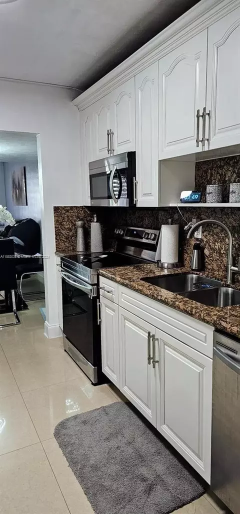 Kitchen - 1676 W 72nd St, Hialeah, FL 33014 photo 4 of 8
