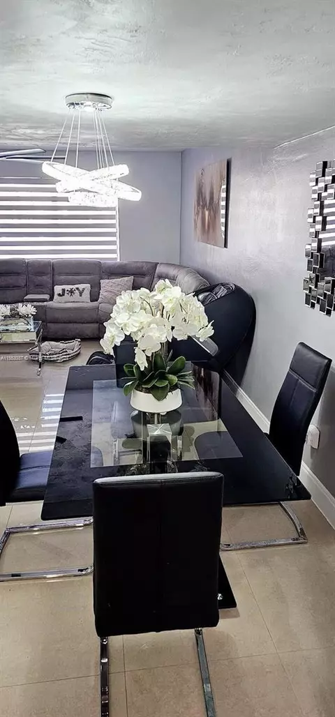 Living - 1676 W 72nd St, Hialeah, FL 33014 photo 9 of 16