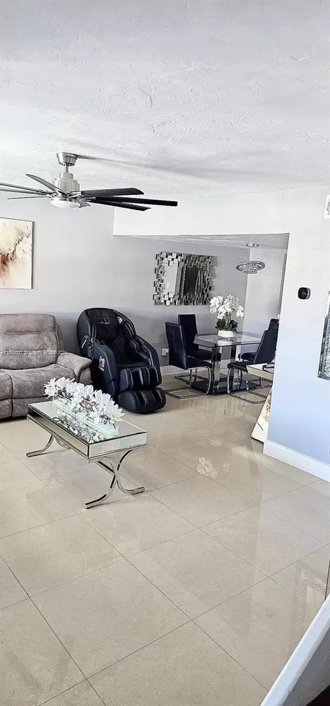 Living - 1676 W 72nd St, Hialeah, FL 33014 photo 10 of 16