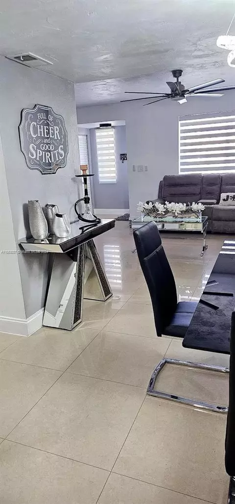 Living - 1676 W 72nd St, Hialeah, FL 33014 photo 7 of 16