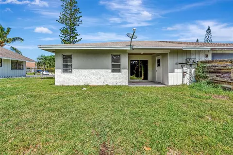 Exterior - 4488 SE Salvatori Rd, Stuart, FL 34997 photo 5 of 7
