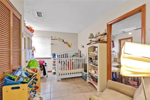 Bedroom - 7300 N Augusta Dr, Hialeah, FL 33015 photo 5 of 5