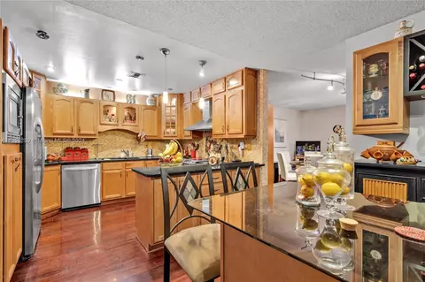 Kitchen - 7300 N Augusta Dr, Hialeah, FL 33015 photo 2 of 3