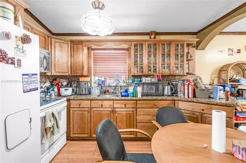 Kitchen - 2439 W 70th St, Hialeah, FL 33016 photo 2 of 2