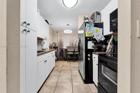 Kitchen - 121 NW 7th Ave, Dania Beach, FL 33004 photo 2 of 5