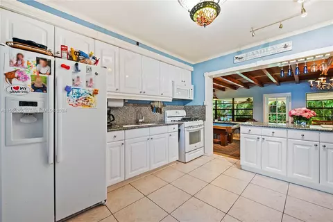 Kitchen - 1150 Plover Ave, Miami Springs, FL 33166 photo 3 of 3
