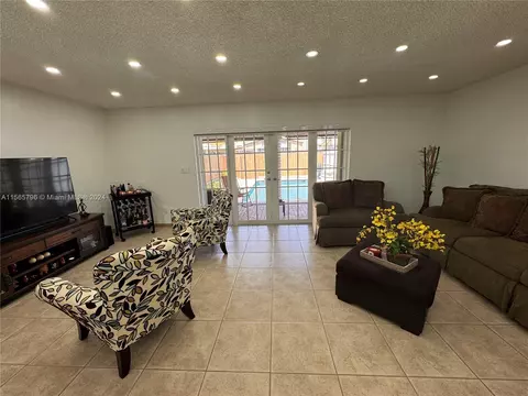 Living - 6950 W 2nd Ct, Hialeah, FL 33014 photo 4 of 5