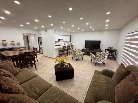 Living - 6950 W 2nd Ct, Hialeah, FL 33014 photo 2 of 5
