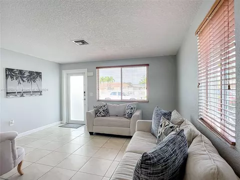 Living - 4351 E 8th Ln, Hialeah, FL 33013 photo 1 of 9