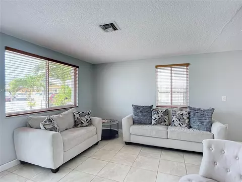 Living - 4351 E 8th Ln, Hialeah, FL 33013 photo 5 of 9