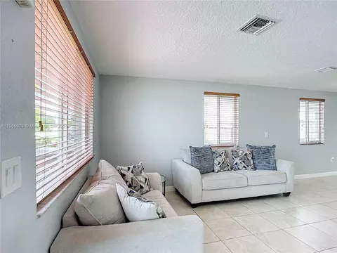 Living - 4351 E 8th Ln, Hialeah, FL 33013 photo 2 of 9
