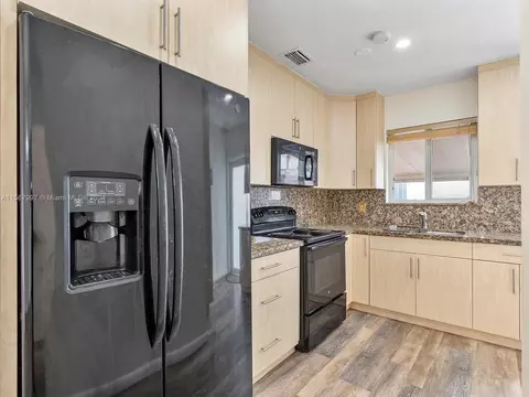 Kitchen - 151 E 52nd Pl, Hialeah, FL 33013 photo 1 of 2