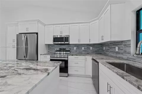 Kitchen - 7979 18th Pl, Labelle, FL 33935 photo 2 of 3