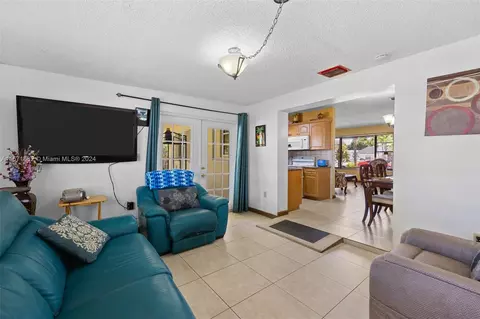 Living - 5470 W 9th Ave, Hialeah, FL 33012 photo 7 of 8