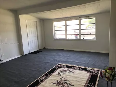 Living - 730 SE 1st Pl, Hialeah, FL 33010 photo 2 of 2