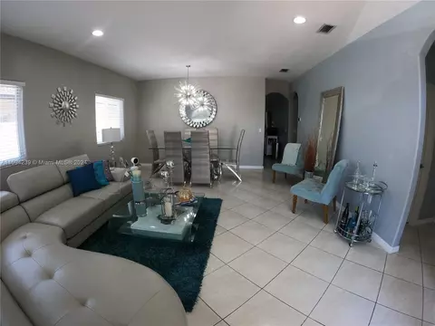 Living - 19880 NW 78th Path, Hialeah, FL 33015 photo 1 of 4